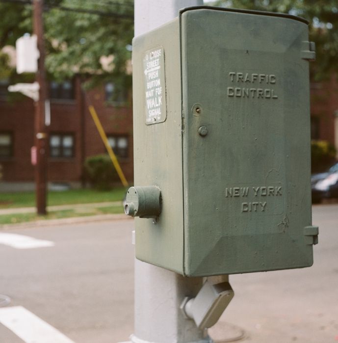 NYC Traffic Control box
A nice relic from the mechanical era, it makes a pleasant "CLICK-BUZZZZ-CLACK" sound as the signals change. I found it controling a quiet residential intersection near my home.
Keywords: Traffic_Lights