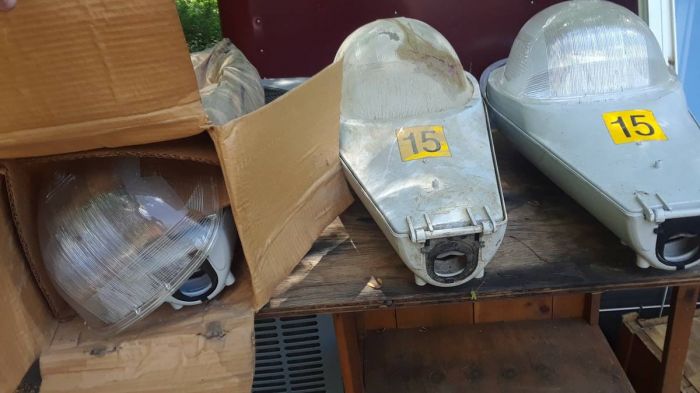 Potential Craigslist Score? (07/28/2017)
This guy has three NOS 150W HPS AE 113s, six "220V power supplies" (Hubbell high bay ballast housings actually...), three GE 150W HPS lamps, and a "bag of miscellaneous hardware" all for sale as a lot for $250 or best offer. I'm going to try to make an offer of $100 for the three street lights and lamps and see where that gets me.

Looks like one lens is broken and one fixture is still in the box! That one on the far left is a keeper for sure. NOS-in-the-box HPS lights will only get harder to find. The others will get cleaned up and 
Keywords: American_Streetlights