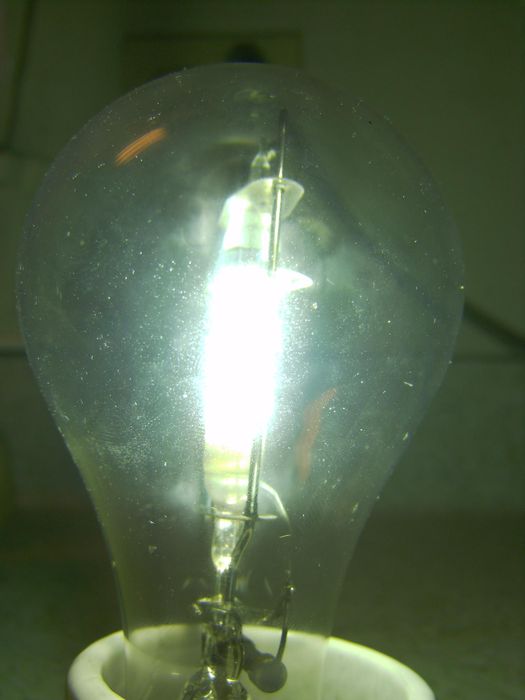 Westinghouse S-4 100w Mercury Lamp
UV emitting lamp used in early sunlamps.
I don't think my camera liked the UV, none of the pics came out very good.
And YES, I wore eye protection!!!
Keywords: Lamps
