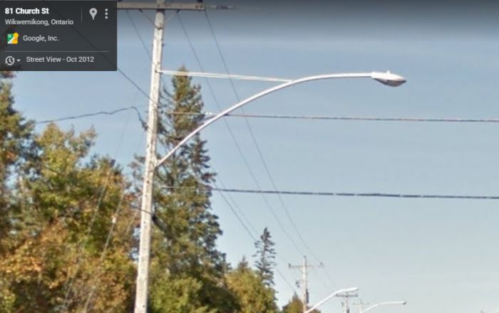 Fish Head light in Northern Ontario
Didn't see it in person. Was just streetview cruising. Lots of old oddball MV lights up there.
Keywords: American_Streetlights