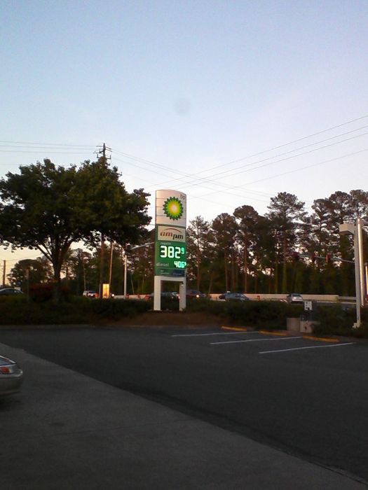 BP AM/PM Gas Station Sign
Here how expensive the gas price for regular unleaded.  For the smaller one is for the diesel fuel price.

This gas station is located at 605 North Greenbriar Parkway, Marietta, GA, USA.

The US$ 3.829 is how much per gallon which I filled up at that location.
Keywords: Lit_Lighting