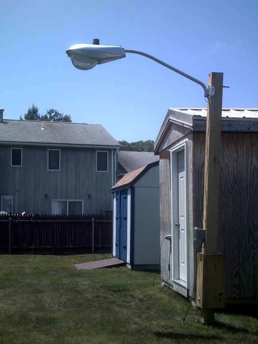 My Powerlite R37 Installed in the Backyard!
Looks great! Pole ain't too great though. It's rocking all around in the wind. I'll have to fix this before the pole falls down... 
Keywords: American_Streetlights