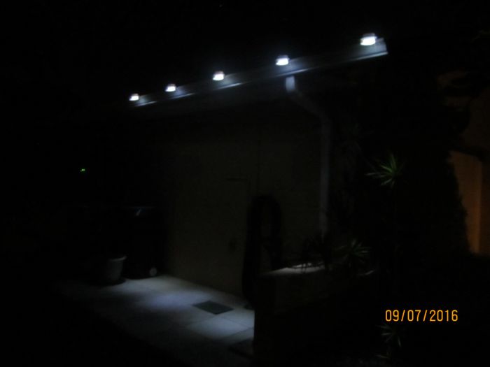Solar Gutter Lights Night Scene
Here are the 5 solar gutter lights I have installed on the side of the house near the trash containers. I installed them to provide some light for when we have to take any trash out at night. This pic does pretty good at showing how bright they are.
Keywords: Misc_Fixtures