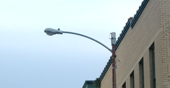 Old Metal Pole with Unoriginal Arm
the original arm was a bottom braced upsweep,the new arm is a simple curved upsweep that goes on a traffic signal pole.
Keywords: American_Streetlights