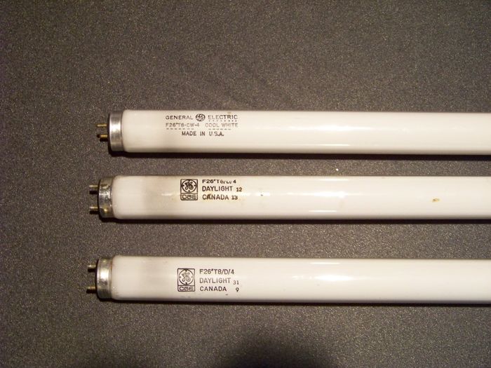 Three of the 7 appliance tubes gotten from the flea market.
These are the 3 most interesting finds. The four others were: 2 pre-CGE /CW, a CGE /CW and a Sylvania. From top to bottom:

- Interesting GE F26T8/CW/4 from USA. The date code is odd on that one, so any help to date it will be greatly appreciated!

- CGE F26T8/D/4 from Jan. 12, 1982.

- CGE F26T8/D from Sep. 31, 1981
Keywords: Lamps