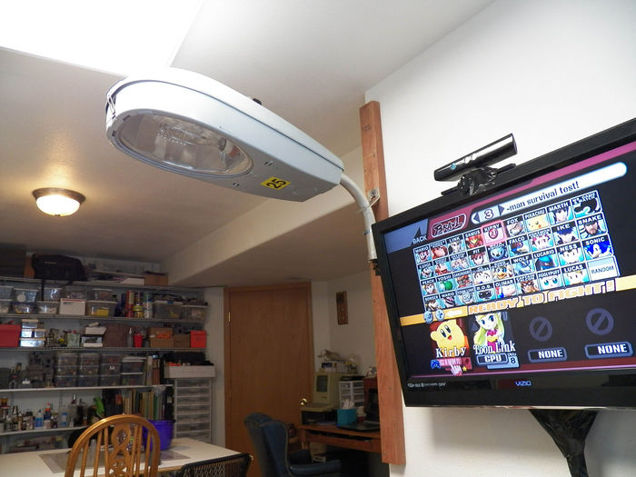 Streetlight display.
This is the other view, showing the opposite direction of the other side.

Right now the M-400 R3 is mounted, and I can switch it on and off from my seat right here.

(And yes, that is Super Smash Bros Brawl on the TV, dunno if you guys play that. (Except Vince, I know he has)
Keywords: American_Streetlights