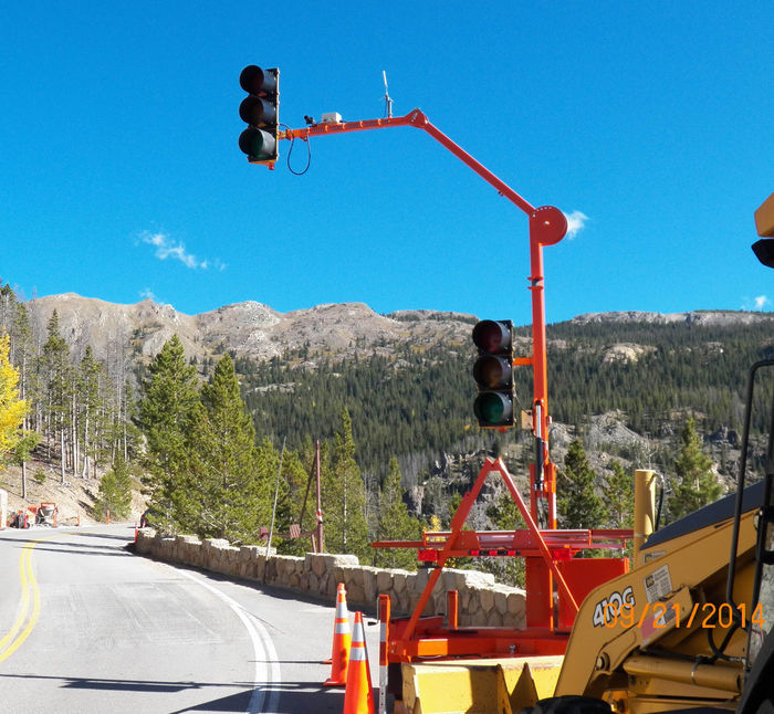 Temporary Traffic Light.
This was up in Rocky Mountain National Park on US highway 34. Even though it is a US highway, in the national park it is way different. Doesn't seem like a US highway. xD

You can see the mountains in the background. This isn't in use at the moment, it was a busy weekend. But I got to check the stuff out.
Keywords: Traffic_Lights