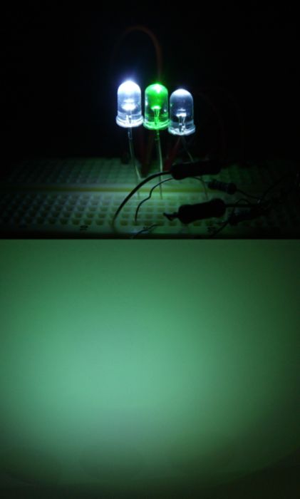 Lighting experiment #1: Two white LEDs and one green LEDs to make as a clear mercury vapor lamp
So I was thinking of this since orange LEDs can act as a HPS lamp. So I thought can two white LEDs, and one green LED make as a clear mercury vapor lamp, and it does! Correct me if I'm wrong on this. But this experiment was for fun, because I was bored. But yeah. Plus why are so many resistors but when theres only three LEDs? Because I had other LEDs to make this out, but the blue LEDs wouldn't make it as these three (two white LEDs, and one green LED) can.
Keywords: Lit_Lighting