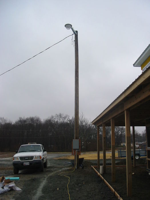Temporary power pole.
Here is the temp. power pole I built at work. I think it looks good with my 400 watt merc. Power Bracket on it. The guys wanted to go buy Chinese junk at the hardware store. i think they like this better. 
Keywords: Miscellaneous