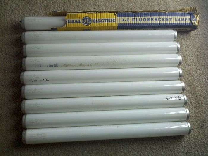 Whoa quite a find! 1950s GE fluorescents!
Here are 8 GE 15w T-12 Whites from '51 and one GE 15w Cool White from '59 (with ordering code on etch). The '51 ones have no notches on the end caps and are only 3000 hour. Got them for cheap at a thrift store in Ventura.
Keywords: Lamps