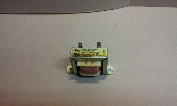 Frost FBAK-10 preheat ballast
Saved from a 1980s cooking range. It is dated 5/87, unlike my other FBAK-10 specimens which are not dated. Ohmmeter reads 23 ohms, which is a little low but I guess it's fine. Some of my preheat chokes read over 30 ohms.

Another odd thing is the 115V rating, which is unusual for most preheat ballasts I've saved, especially Frost ones!
Keywords: Gear