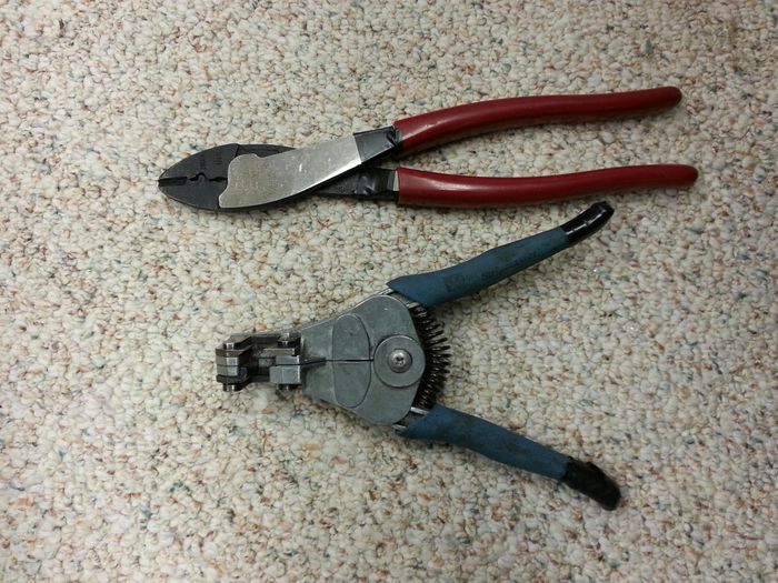 stakon and ideal automatic stripper
These are my 2 favorite tools. I change lots of ballasts live with them 
I also recently purchased a long shaft magnetic 1/4 in and 5/16 nut driver so I don't loose anymore ballast screws 
Keywords: Gear
