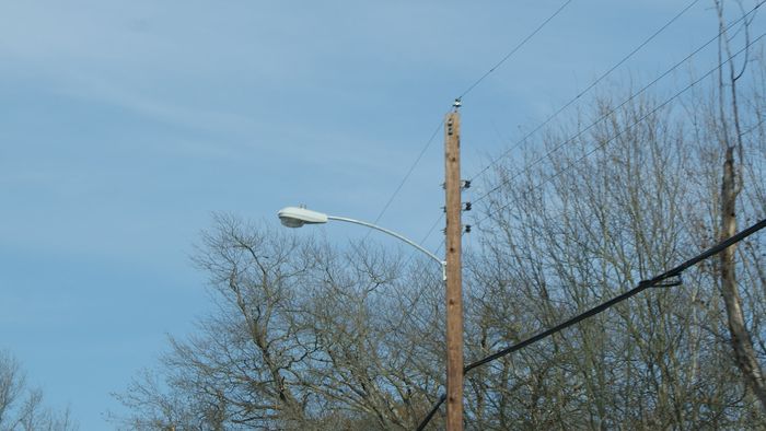 New Location For a Streetlight....
not only is the streetlight new...but this location previously had no streetlight whatsoever.
Keywords: American_Streetlights