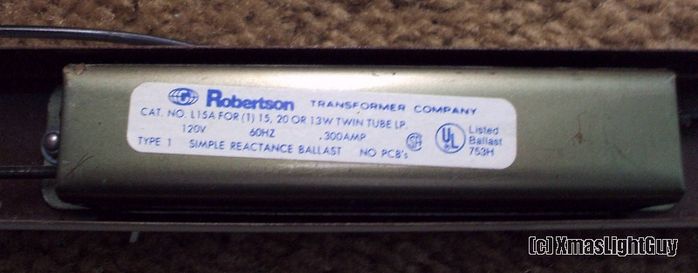 Robertson Ballast In Lampi F18T8 Fixture
A "Robertson Transformer Company" F15/F20 preheat ballast. 
This has a long slim design compared to 'standard' F20 preheat ballasts
Its also fairly noisy (quite annoying LOL) and is riveted to the fixture (typical in Lampi's)

The fixture is [url=http://www.galleryoflights.org/mb/gallery/displayimage.php?pos=-3595] pictured here [/url]
Keywords: Gear