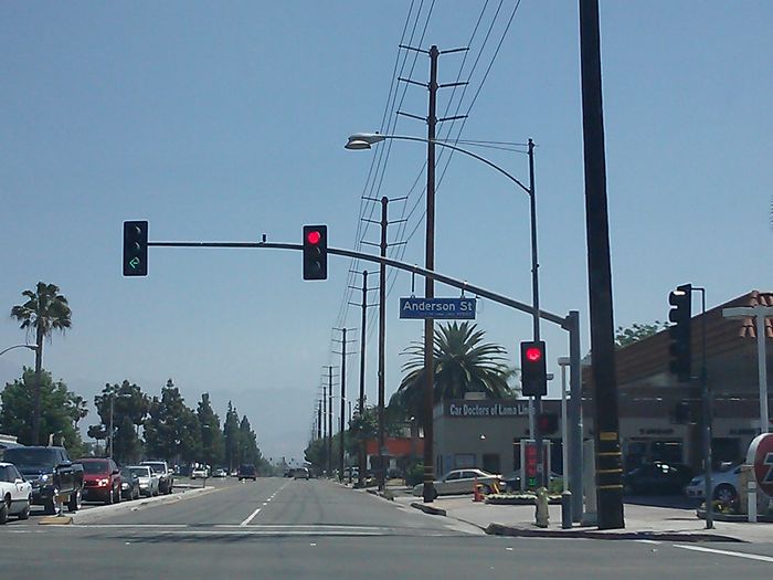 Left Turn Added
A new shorter pole with longer arm for a left turn head. The older double-guy was left for the safety light.
Keywords: Traffic_Lights