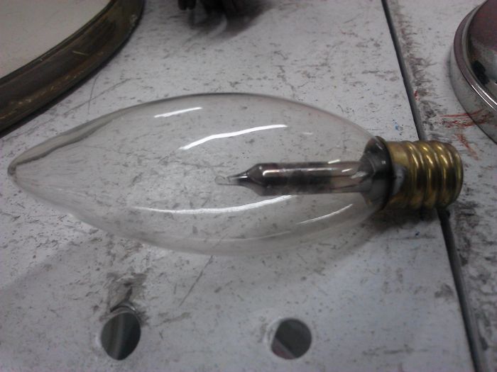 Blown Candle Bulb
3 volt bulb for a battery powered candle, looks like it was put in a 120v socket. Has same candelabra base as chandelier bulbs.
Keywords: Lamps