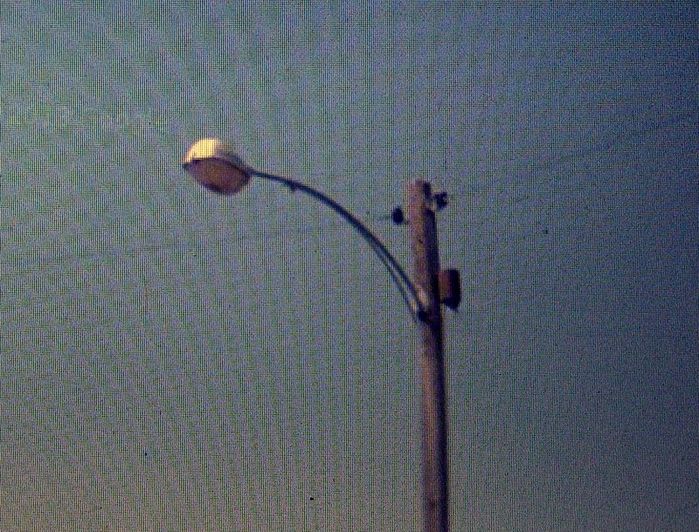 Larned KS
Street view pic of a form 400 and remote ballast on a series system. This is on Broadway south of downtown.
Keywords: American_Streetlights