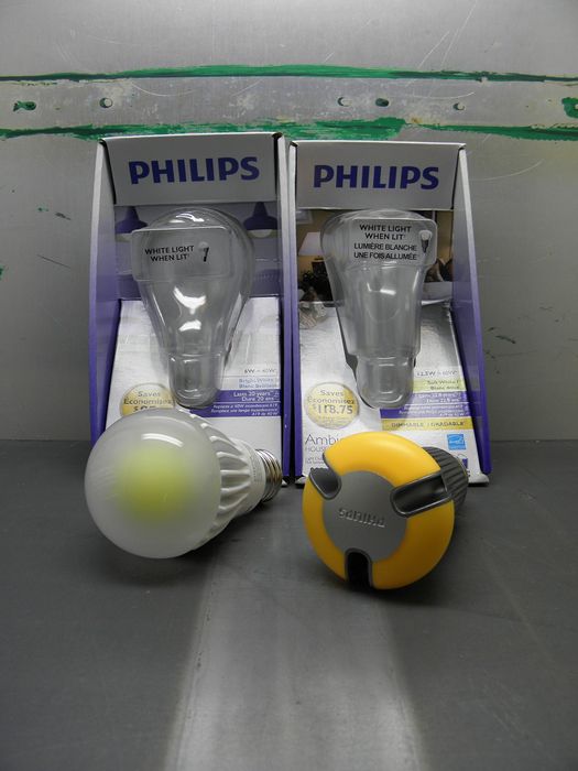 Philips LED Lamps
Here's a couple of my Philips LED lamps, the one on the left is a 5000K 6w and the one on the right a 2700K 12.5w. The 6w lives in my desk lamp while the 12.5w lives in my tester socket. 

I also a have a 7w MR16 and a 4w GU10 LED lamp...also by Philips. 

[url=https://dl.dropboxusercontent.com/u/102661519/Lighting/GoL_Pics/Deleted%20Pics/C_P5065319_M.JPG][img]https://dl.dropboxusercontent.com/u/102661519/Lighting/GoL_Pics/Deleted%20Pics/normal_C_P5065319_M.JPG[/img][/url] 

Here's a Philips MR16 LED I found at Restore the other day and it looks like it's one of the better LED retrofits I've seen so far. Interestingly it has a small cooling fan inside the blows air over a internal heatsink...similar to a CPU cooler to cool the insides. I'm currently testing it inside one of those MR16 recessed can lights. 

[url=http://www.candlepowerforums.com/vb/showthread.php?312061-Philips-10-watt-AmbientLED-MR-16]Click here[/url] to see some a similar 10w one disassembled. 
Keywords: Lamps