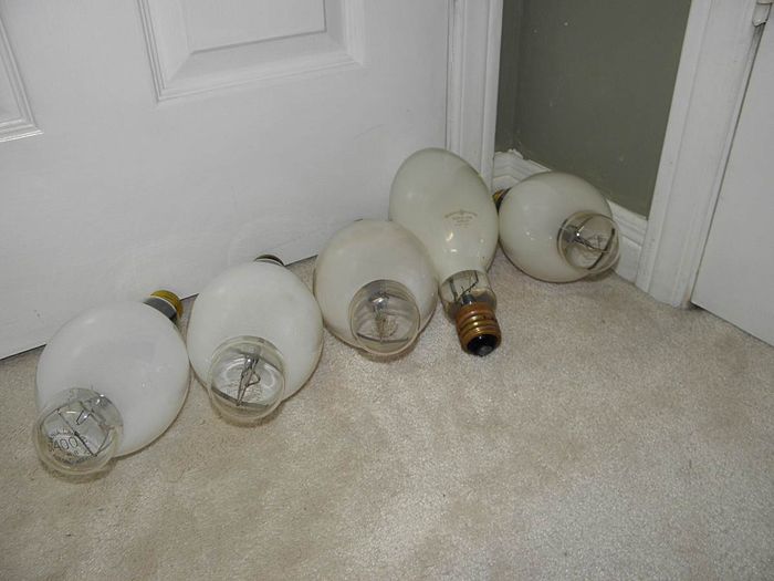 Dude...
I found all of these 400w vintage mercs at Restore today. They were sitting in a old Sylvania HID box and all came in Sylvania sleeves with [url=http://www.galleryoflights.org/mb/gallery/displayimage.php?pos=-679]this[/url] design. 

The lamps from left to right are:

Sylvania /DX Date code 16R, the only NOS lamp from the lot April 1981
Westinghouse Canada /DX Lifeguard, date code 01 October 1981
Westinghouse /DX Weather Duty Lifeguard, date code 3 on top, 70 under July 1970
GE /C Bonusline ED, date code 39 March 1967
GE /C Bonusline BT, date code 94 October 1963

Thanks to Dave for dating all the lamps for me. 

Here's some closeups of the etches:
[url=http://i560.photobucket.com/albums/ss50/joseph_125ON/Gallery%20of%20Lights/COLIMG_1653_M.jpg][IMG]http://i560.photobucket.com/albums/ss50/joseph_125ON/Gallery%20of%20Lights/COLIMG_1653_S.jpg[/IMG][/url]

Click to enlarge
Keywords: Lamps
