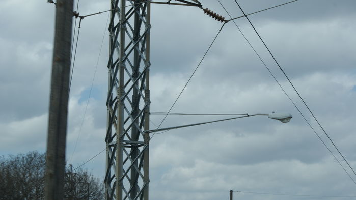 Crouse Hinds OVM on a Steel Lattice Power Tower
not very many are mounted like this.

Steel Lattice Tower carries a 69 KV Line that Feeds Two Substations.
Keywords: American_Streetlights