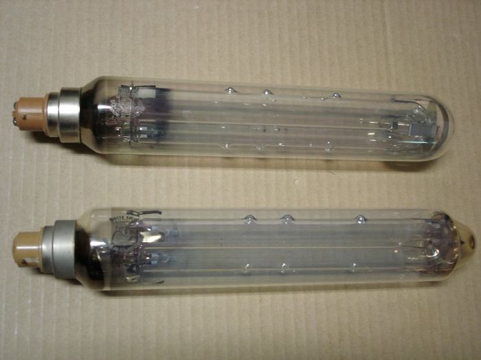 Philips 35W LPS
Here are a couple of Philips 35W low pressure sodium lamps.

Manufactured: Top June 1973
                       Bottom Sept. 1985
Made in: Top Holland
              Bottom Great Britain
Keywords: Lamps
