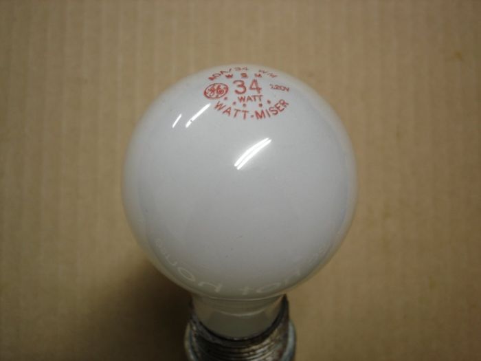 GE 34W Watt-Miser Incandescent
A 34W GE Watt-Miser frosted incandescent with a red etch.
Voltage: 120V
Date: 1985
Lumens: 380
Lamp life: 2000 hours
Filament: CC-6
Lamp shape: A19
Made in: USA
Base: Medium E26
Keywords: Lamps