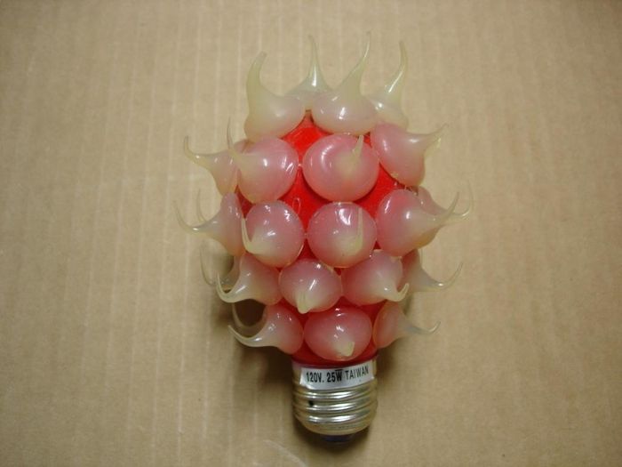 Coloured Spike Lamp
Here is a red coloured decorative lamp with silicone spikes on it.

 Made in: Taiwan
Keywords: Lamps