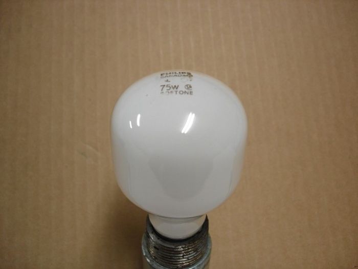 Philips 75W
Here's a Philips Canada 75W Softone lamp.
Voltage: 125V
Date: Early 90's
Filament: CC-6
Lamp shape: T19
Made in: Canada
Base: Medium E26
Keywords: Lamps