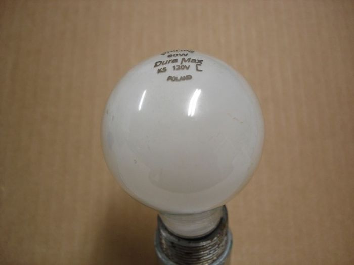 Philps Dura Max 60W
Here's a Philips 60W Dura Max lamp made in Poland.
Voltage: 120V
Date: Oct. 2005
Lumens: 830
Lamp life: 1500 hours
Filament: CC-6
Lamp shpe: A19
Made in: Poland
Base: Medium E26 
Keywords: Lamps