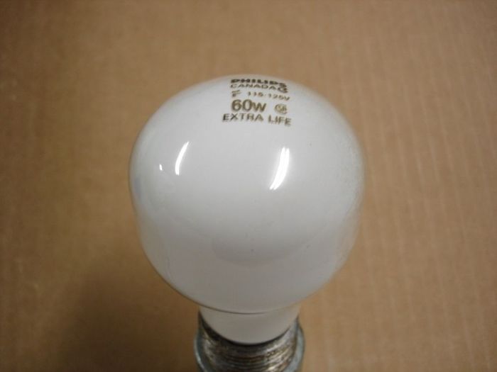 Philips 60W
Here's a Philips Canada 60W Extra Life incandescent.Has a date code 1L Nov 81.
Voltage: 115-125V
Date: Nov. 1991
Filament: CC-6
Lamp shape: T19
Made in: Canada
Base: Medium E26 Aluminum
Keywords: Lamps