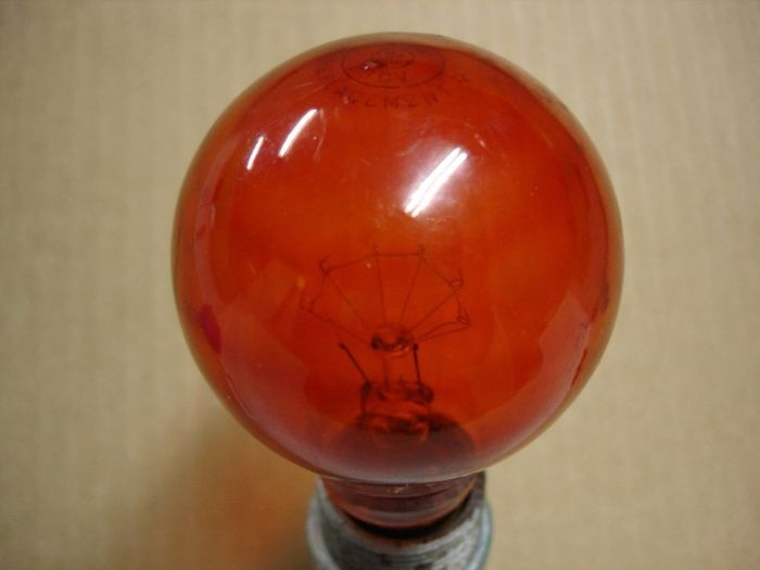 GE 40W Orange
Here is a GE 40W orange "Group Replacement" lamp.
Voltage: 130V
Current: 0.29A
Lamp life: 2000 hours
Filament: C-9
Lamp shape: A21
Base: Medium E26 brass
Keywords: Lamps