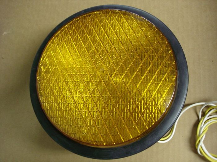 Dialight LED
I recently got this yellow 8" Dialight LED for my traffic light,I just need to find a red and green.

Made in: Mexico
Manufactured in: 2008
Keywords: Traffic_Lights