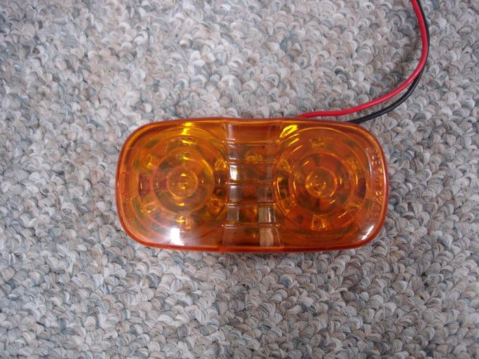 LED Light
Here is a 12 volt 16 LED no-name amber clearance/marker light.

Made in: China
Keywords: Miscellaneous