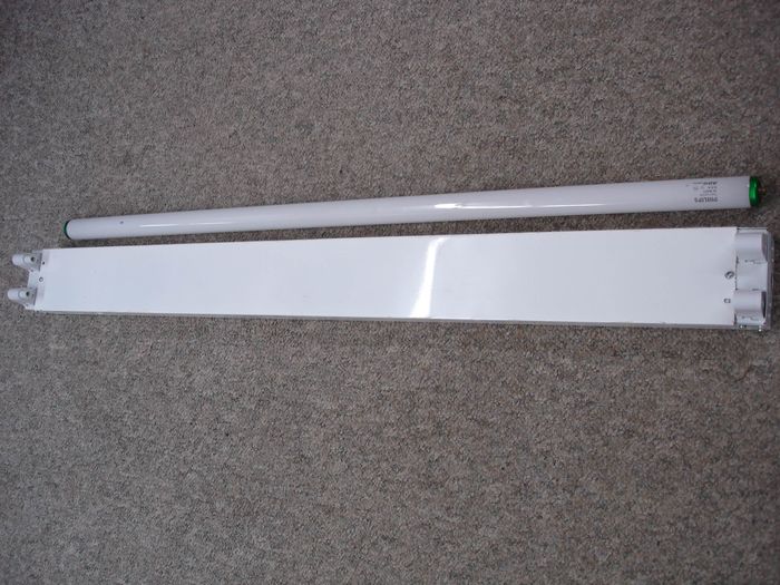 Lithonia Fixture
Here is a Lithonia fluorescent strip that was originally an 8 footer,it was damaged and I chopped it down into 4 footer. Next to it is one of the special order Philips F48T12/CW lamps that turned out to be $30 each. 
Keywords: Indoor_Fixtures