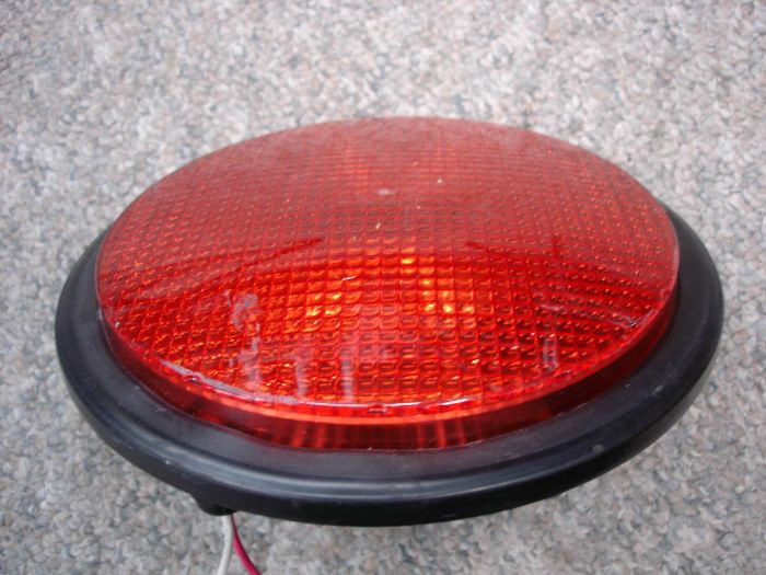 Dialight 8" Red LED Traffic Light
Here's a Dialight  8 inch red traffic light module. 

Made in: Mexico
Keywords: Traffic_Lights