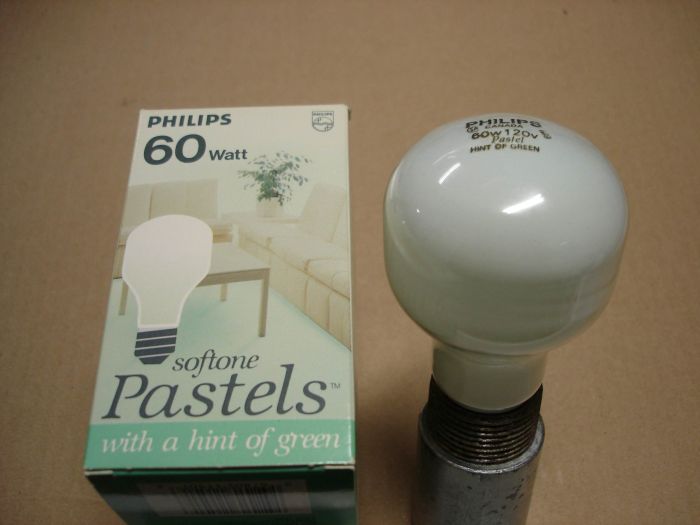 Philips 60W 
Here is a Philips Canada 60W Softone Pastels lamp with a 'hint of green'.

Made in: Canada

Manufactured: December 1989
Keywords: Lamps