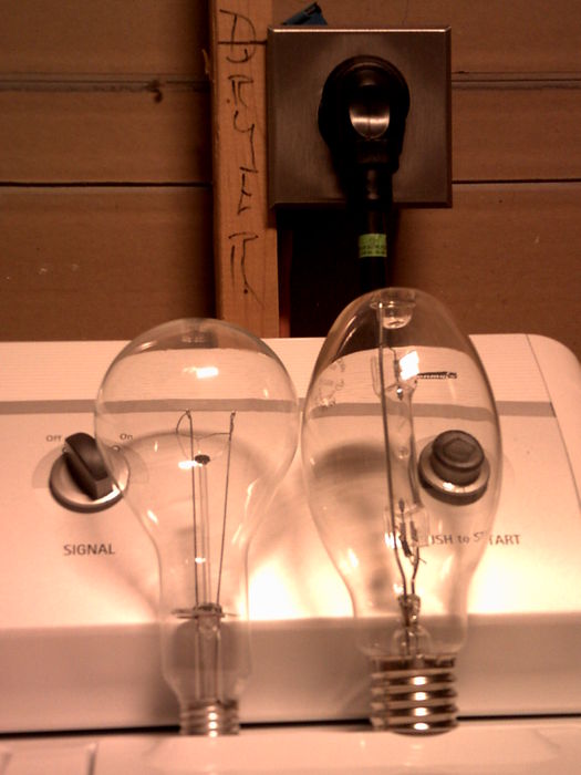 My 300w Incandescent next to a 175w merc.
Both are Sylvania. I was disapointed to find the base was medium, but i still love this lamp. 300 watts! Very bright too.
Keywords: Lamps