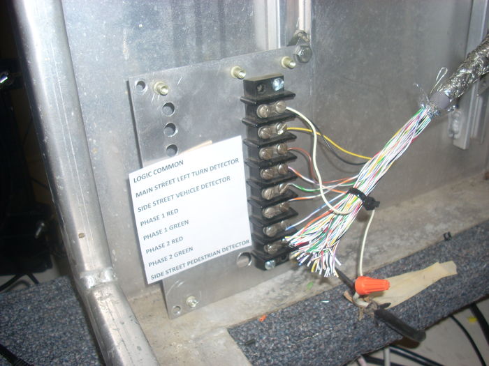 Detectors hooked up
Connections from the video processor and the pedestrian cross-walk button are hooked up on this new detector logic panel
Keywords: Traffic_Lights