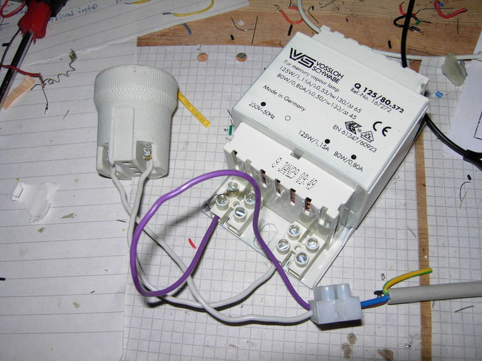 125/80 watt mercury vapor ballast
One of my two 125/80 watt mercury vapor ballasts and ceramic E27 socket. It has 2 taps on the choke for a 125 watt or 80 watt lamp.

I bought them on German eBay because finding these things in Sweden is extremely difficult, despite the fact that mercury lighting is very common here. The only store I know that sells mercury vapor ballast in Sweden refuse to sell to non-professional customers. 17  (23 US$) shipping for two these heavy things, but after searching for over a year in other places I bought them
Keywords: Gear