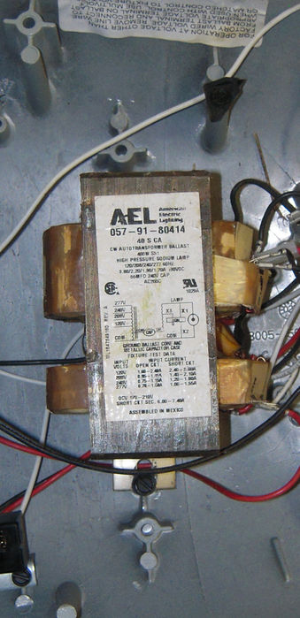 125 ballast label.
Here is the specs of the ballast. I need a cap for this though.

Can you guys look at this and help me find a capacitor that will work with this?
Keywords: American_Streetlights