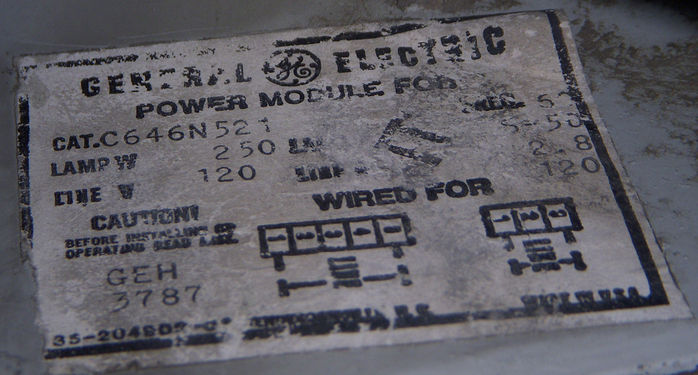Label of Second M-400 A1 FCO.
Here is the label. It seems the power door was made in 1987... I dunno when the FIXTURE was made though...

And luckily.. It was 120 volt! And I think this power door replaced the original one.. I think..
Keywords: American_Streetlights