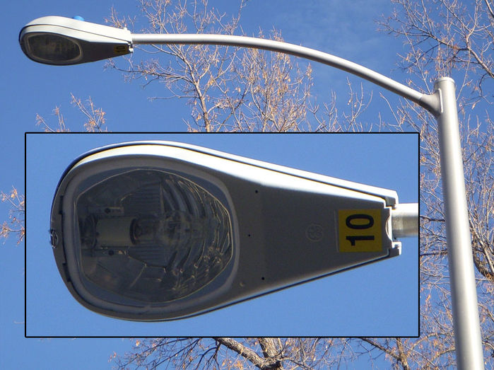 General Electric M-250 R2
Here is another M-250 R2. Just closed this time. 100 watts High Pressure Sodium.

These sure are common in Colorado Springs.
Keywords: American_Streetlights