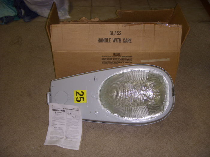M-400 R3 and it's new box.
Here is the brand new light with it's original box. The paper has the specs and info of the fixture.

This fixture wasn't wired for any voltage so the insulated terminal was just hanging out.

Here is the label, note that it says "Wired for not":
[img]http://www.galleryoflights.org/DSCN8019.jpg[/img]
Keywords: American_Streetlights