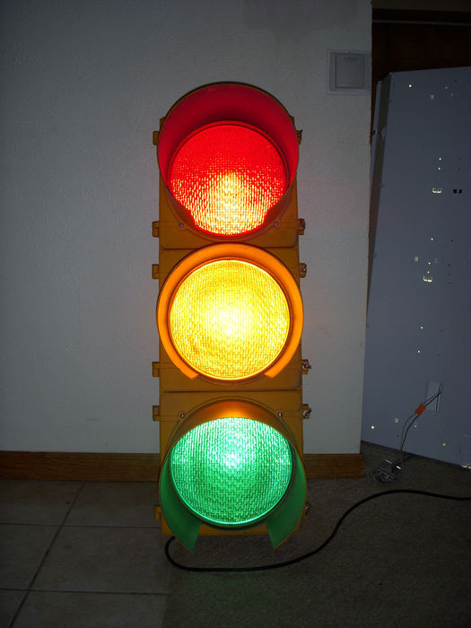 New McCain traffic signal lit!
Here it is lit, looks nice and great in incandescent doesn't it? Especially after I converted this to incandescent.
Keywords: Traffic_Lights