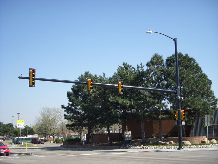 Traffic Signal with Induction light.
Here is a whole view of the signal across the street with an induction light on it. I think this is a fairly new setup, I dunno who maintains the lights. I know the City of Boulder does the traffic SIGNALS but I dunno if they do the lights as well or if Xcel does it.
Keywords: American_Streetlights