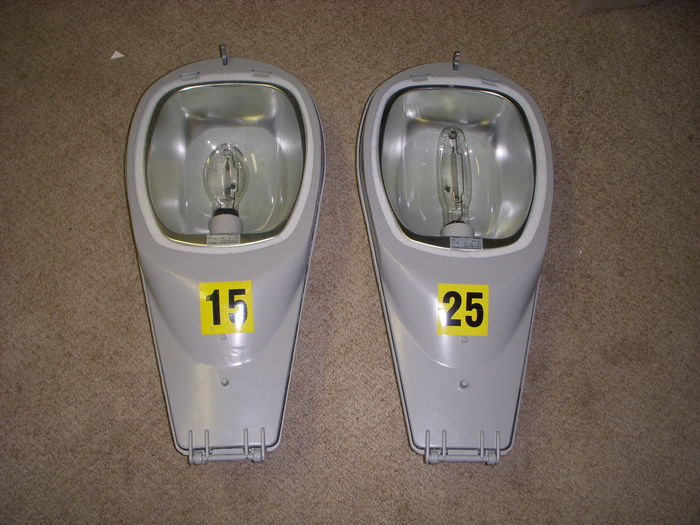Both 115's next to each other.
Here are the two 115's next to each other. They both look identical except on the newer one has little dimples on the door.

When were those dimples added?
Keywords: American_Streetlights