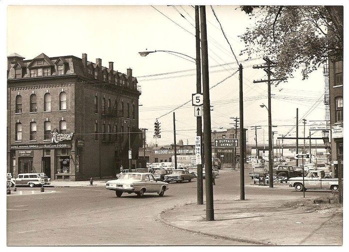 Lower Terrace, Downtown Buffalo, 1960s.
A couple of first generation Westinghouse OV-25s on wooden poles.  And yet another Crouse-Hinds four way signal
Keywords: American_Streetlights