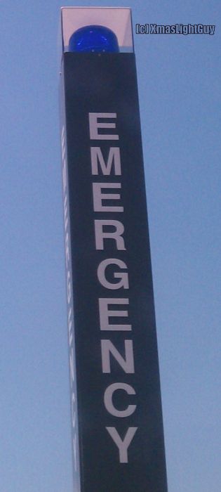 'Emergency' Phone Sign
Sign for an emergency phone at a train station.
I would assume lit with fluorescent, but never know could be LED too.


Location:
Somewhere along the RTD 'A' train line. Denver, CO
Keywords: American_Streetlights