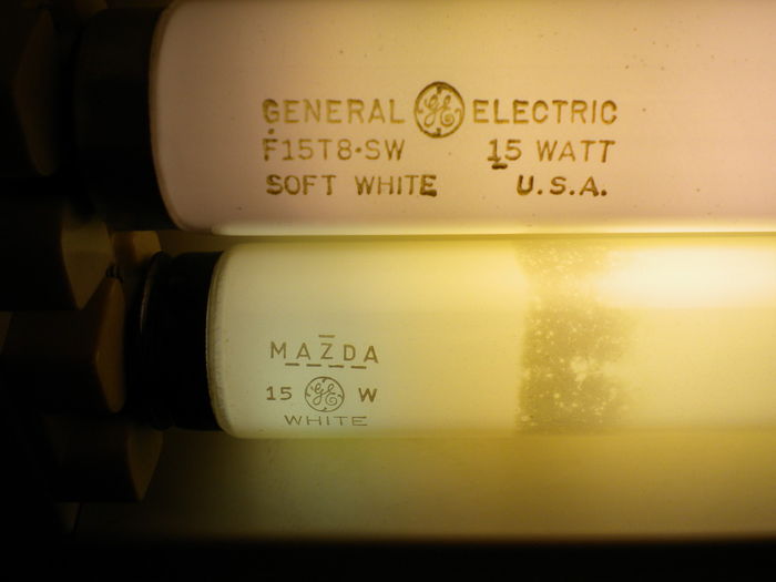 Vintage F15T8 Fluorescent Tubes
These are the two fluorescent bulbs that came in my vintage fluorescent desk lamp. The unit itself is from the 50s or early 60s. The GE-Mazda bulb in the back appears to be a bit older; it may even be original to the unit. It's simply labeled as a "white" bulb. The GE soft white bulb in the front appears to be a newer bulb (maybe an 80s/90s replacement?). Both bulbs still work great!

Also, if anyone wants to see these lamps in action, I've got a video of the whole fixture up:
http://www.youtube.com/watch?v=Wu9BwRWtlVg&list=UU13zLktGX78fKAi9pBaob8A&index=2
Keywords: Lamps