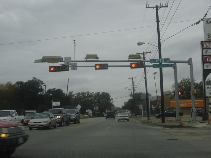 The New....and the Old Signal
if you wondering why the new one is covered up..its because the MUTCD requires all signals that are out of Service (for whatever Reason) to be Covered.

Corsicana,Texas
Keywords: Traffic_Lights